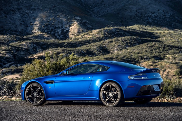 Blue Aston Martin V8 Vantage GTS parked on a road