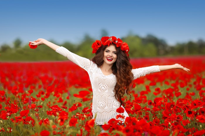Woman with Poppy Wreath in Poppy Field