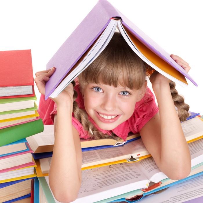Little girl with books