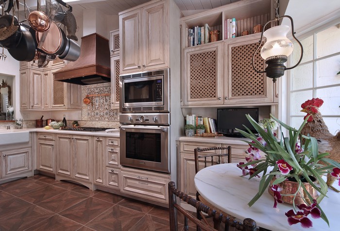 Kitchen Interior Design with Hanging Pots and Lamp