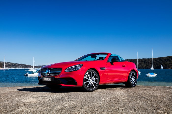 Red Mercedes-Benz AMG SLC 43 Cabriolet by the Water