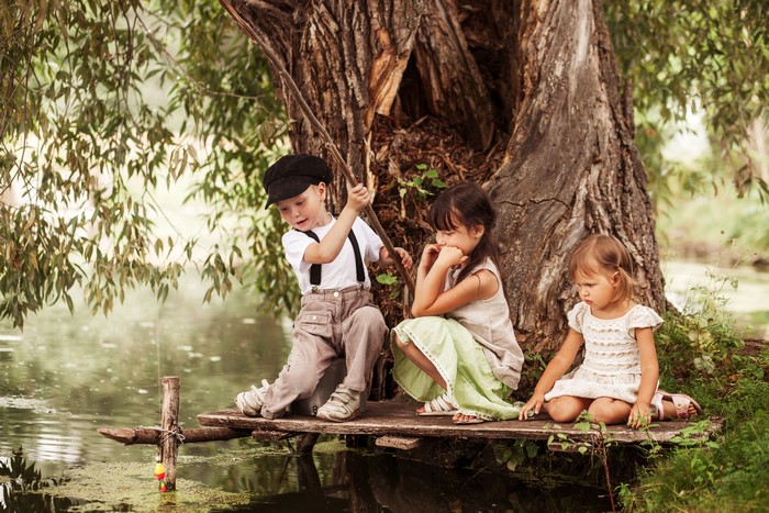 Three Children Fishing by a Large Tree