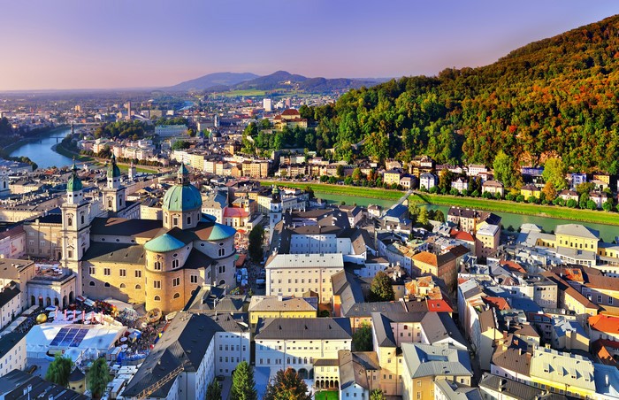 Salzburg cityscape with river and mountains