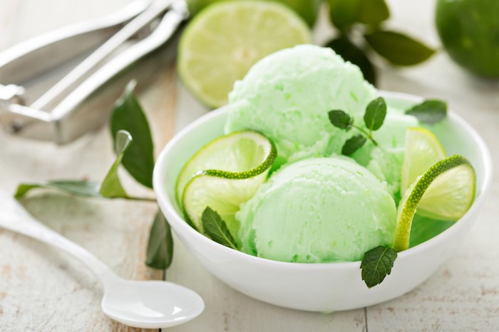 Lime ice cream with mint and lime slices