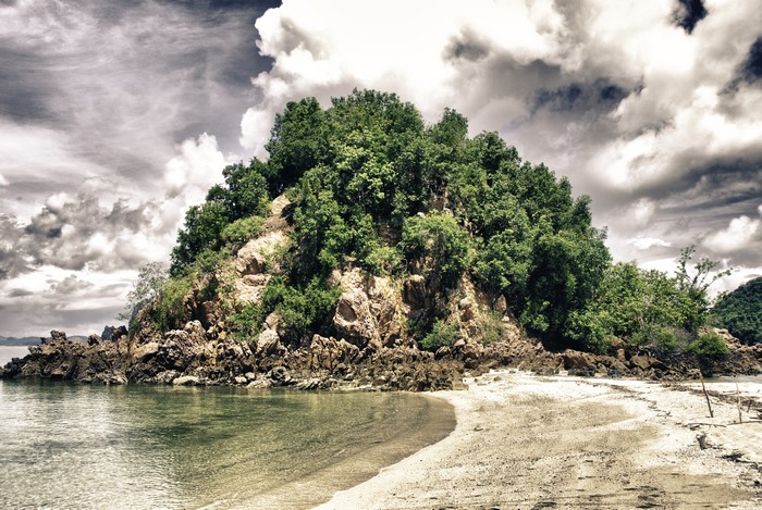Island with trees and rocks in Thailand