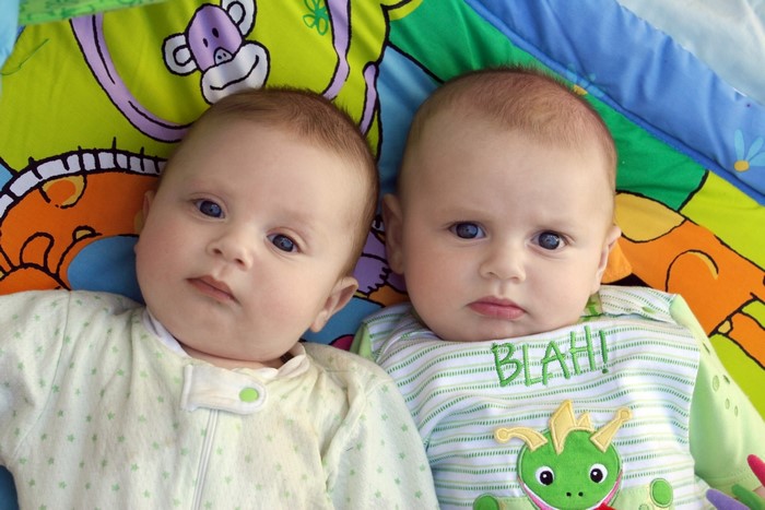Two Infants on a Playmat