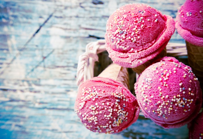 Pink ice cream cones with sprinkles