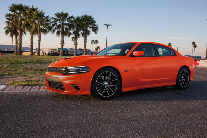 Orange Dodge Charger on a Race Track