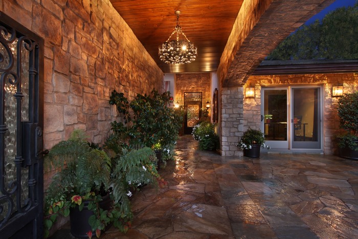 Stone Walkway with Chandelier and Plants