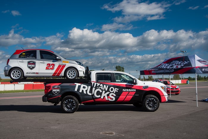 Nissan Titan of Trucks carrying a Nissan Micra