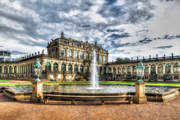 Zwinger Palace courtyard with fountain and lamps, Dresden, Germany