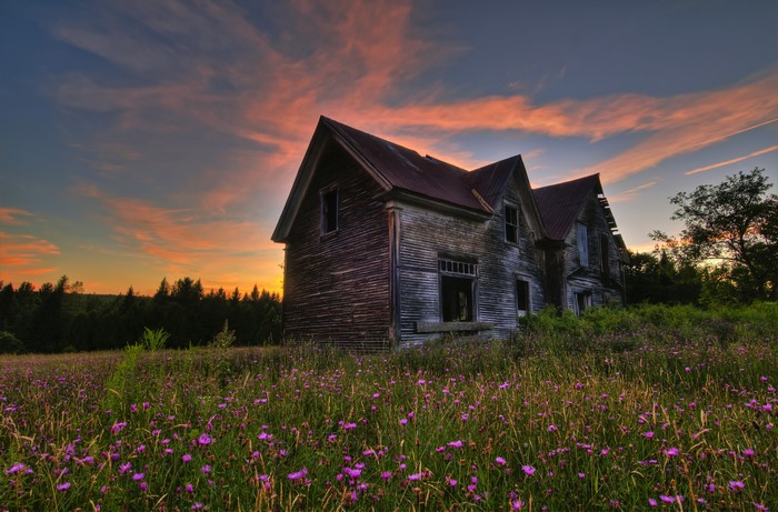 Abandoned house in Quebec at sunset