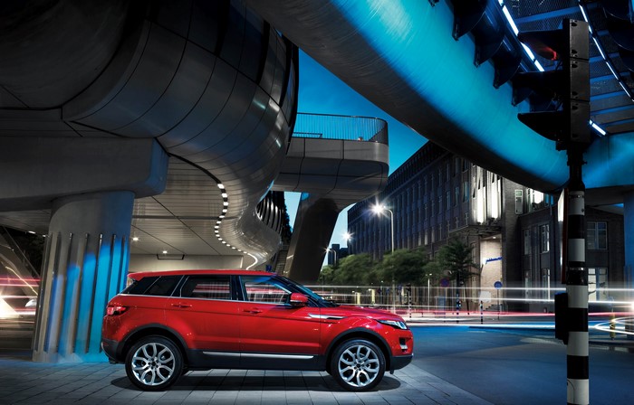 Red 2011 Range Rover Evoque Prestige on City Street