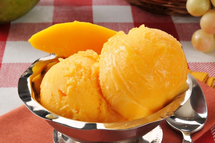 Mango ice cream scoops with mango slice