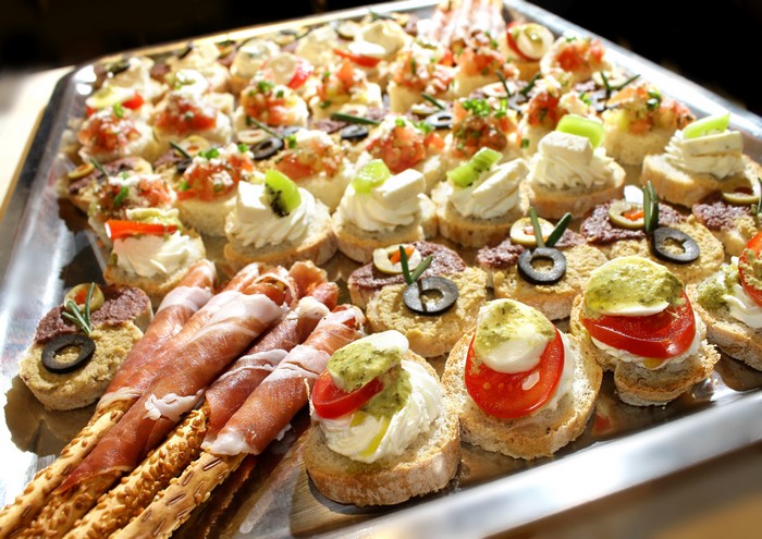 Assortment of Bruschetta and Prosciutto Rolls