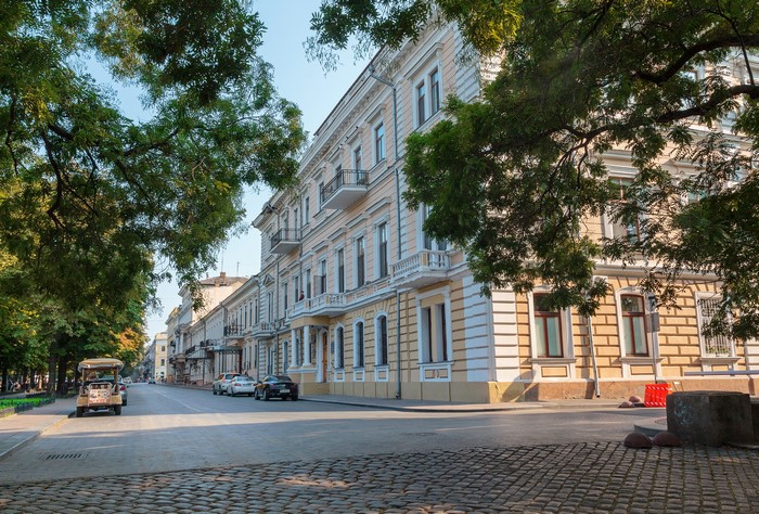 Street view of Odessa Primorsky Boulevard with buildings and trees
