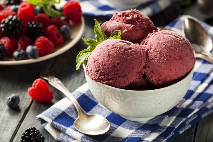 Berry ice cream with fresh berries and mint