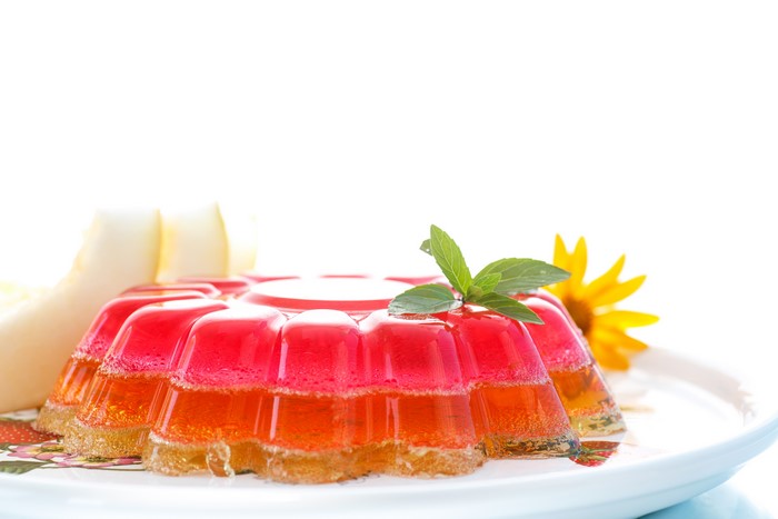 Layered gelatin dessert with fruit and mint