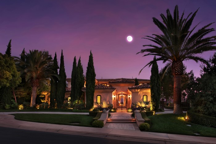Luxury Mansion at Night with Full Moon