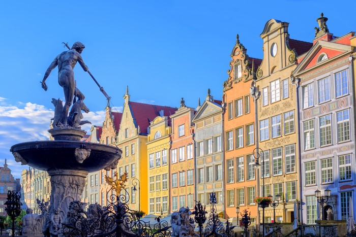 Neptune Fountain and colorful houses in Gdansk, Poland