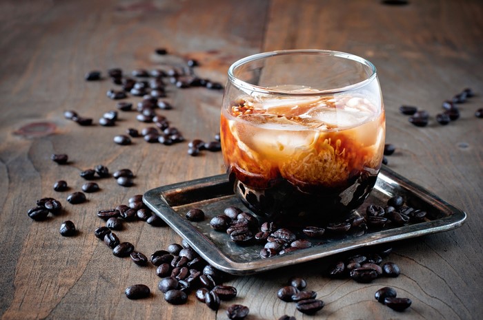 Black Russian cocktail with coffee beans
