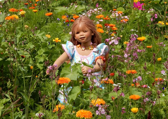 Doll in a field of flowers at Grugapark Essen