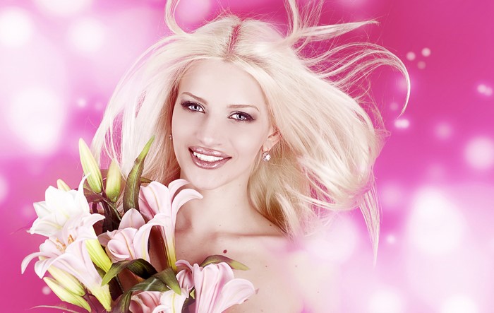 Blonde girl with lilies and makeup