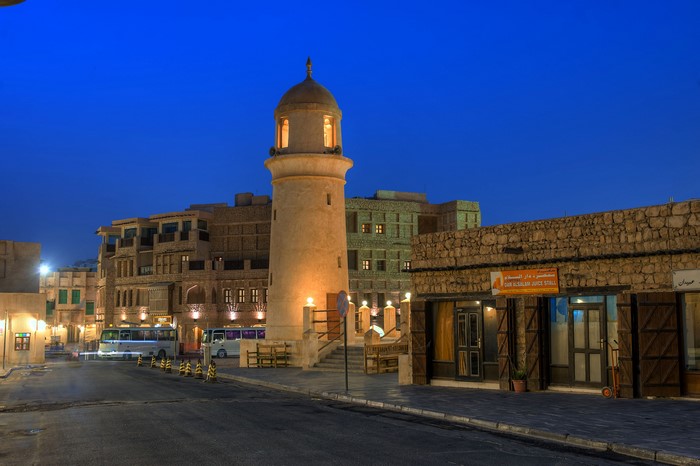 Souq Waqif tower and buildings at night in Doha, Qatar
