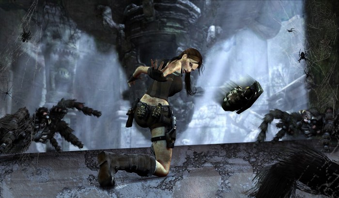 Lara Croft from Tomb Raider fighting spiders