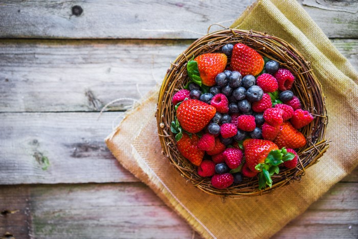 Strawberries, Blueberries, and Raspberries in a Nest