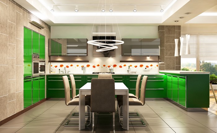 Modern green kitchen with dining table and chairs