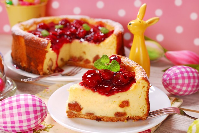 Cheesecake with cherry topping and Easter decorations
