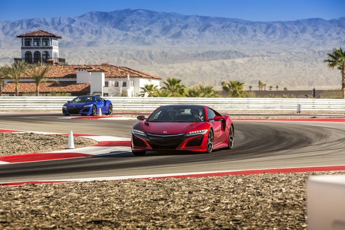 Acura NSX cars on a race track