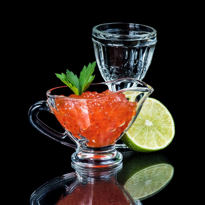 Red Caviar in Gravy Boat with Lime and Shot Glass