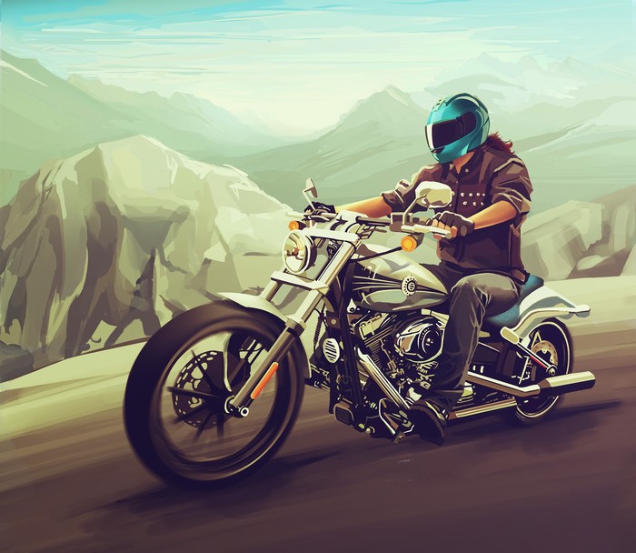 Motorcyclist wearing a helmet riding a Harley-Davidson