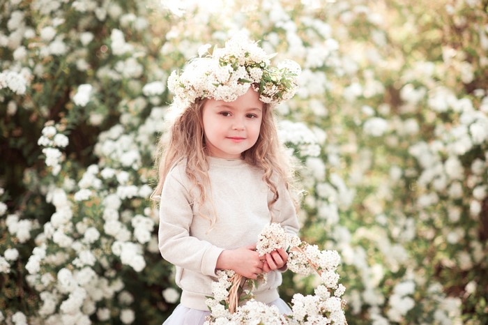 Little girl with flower crown and wreath