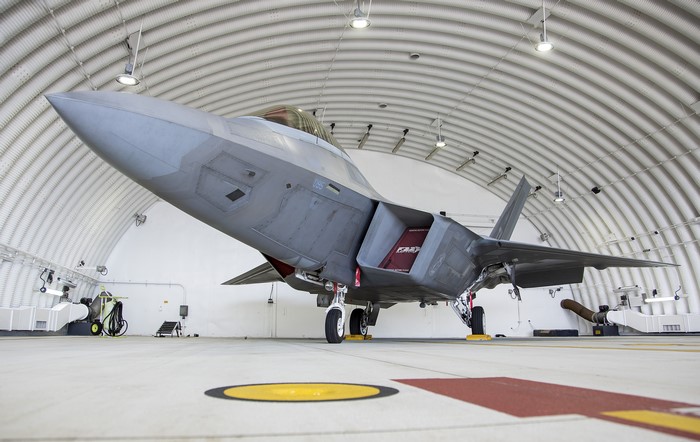 F-22A Lockheed Raptor fighter jet in hangar