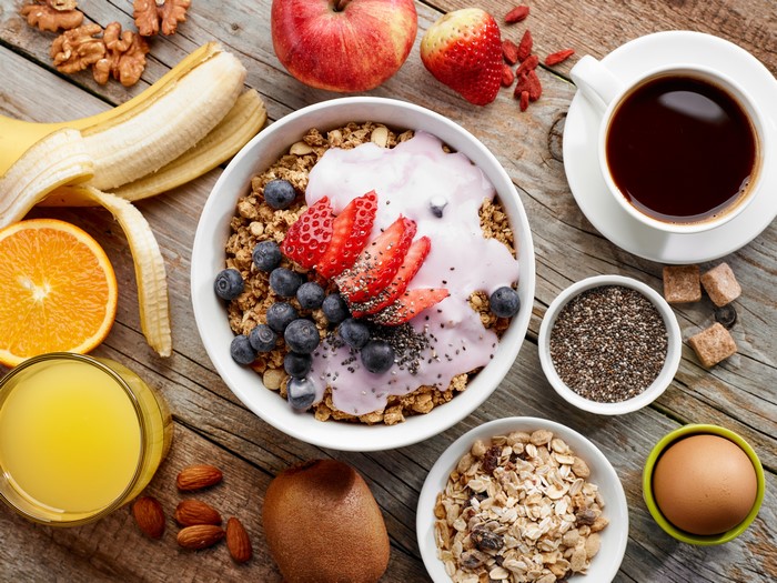 Healthy Breakfast with Coffee, Juice, and Fruits