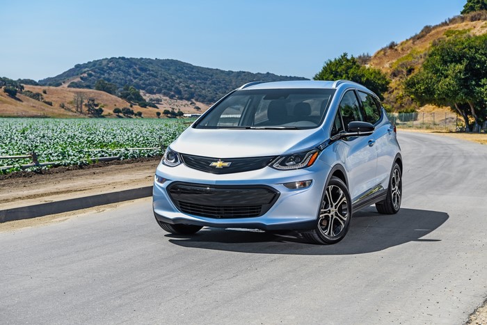 2017 Chevrolet Bolt EV on a road with fields