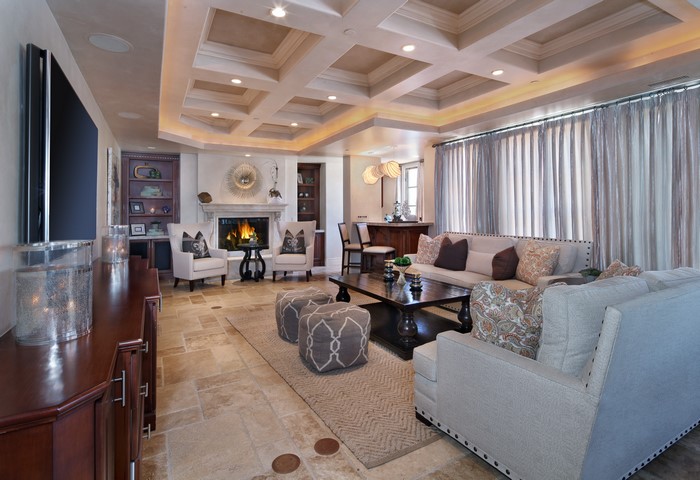Living room with coffered ceiling and fireplace