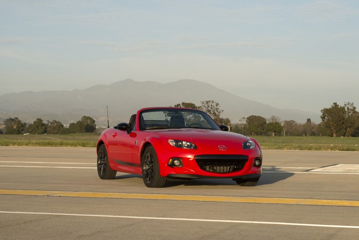 Red Mazda MX-5 Miata Convertible on Road
