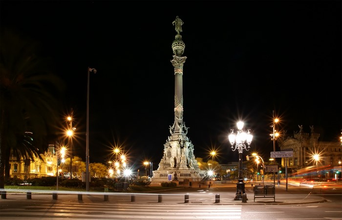Columbus Monument at night in Barcelona, Spain