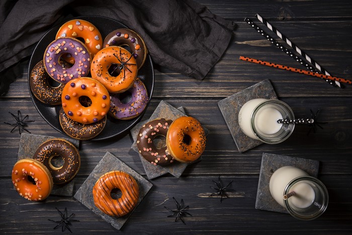 Halloween donuts with milk and spiders