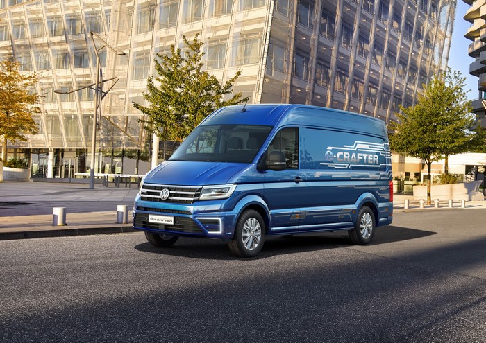 Blue Volkswagen e-Crafter van on a city street