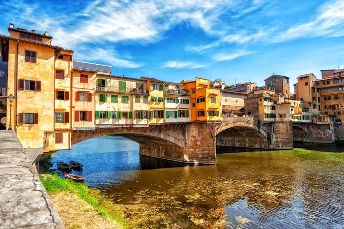 Ponte Vecchio bridge with buildings over the Arno River in Florence, Italy