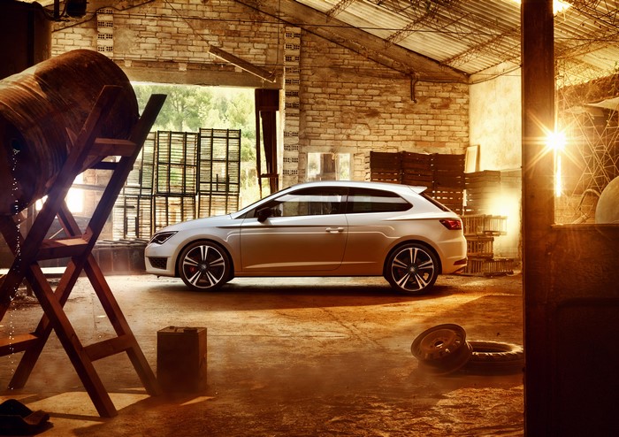 White Seat Leon 2015 in a rustic garage