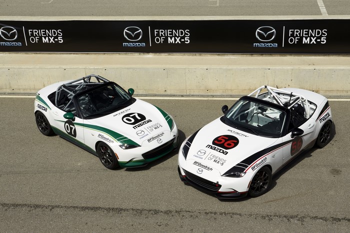 Two Mazda MX-5 Cup cars with racing numbers 07 and 56