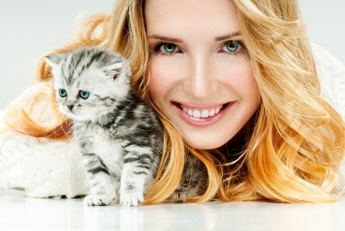 Blonde girl with kitten