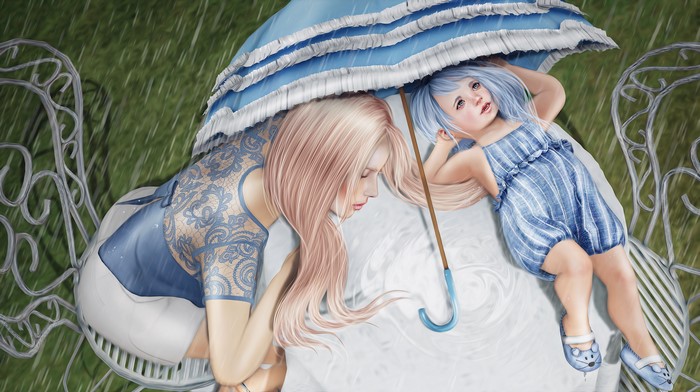 Two girls under an umbrella in the rain