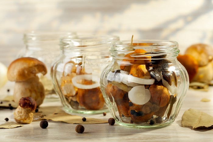 Mushrooms in jars with spices
